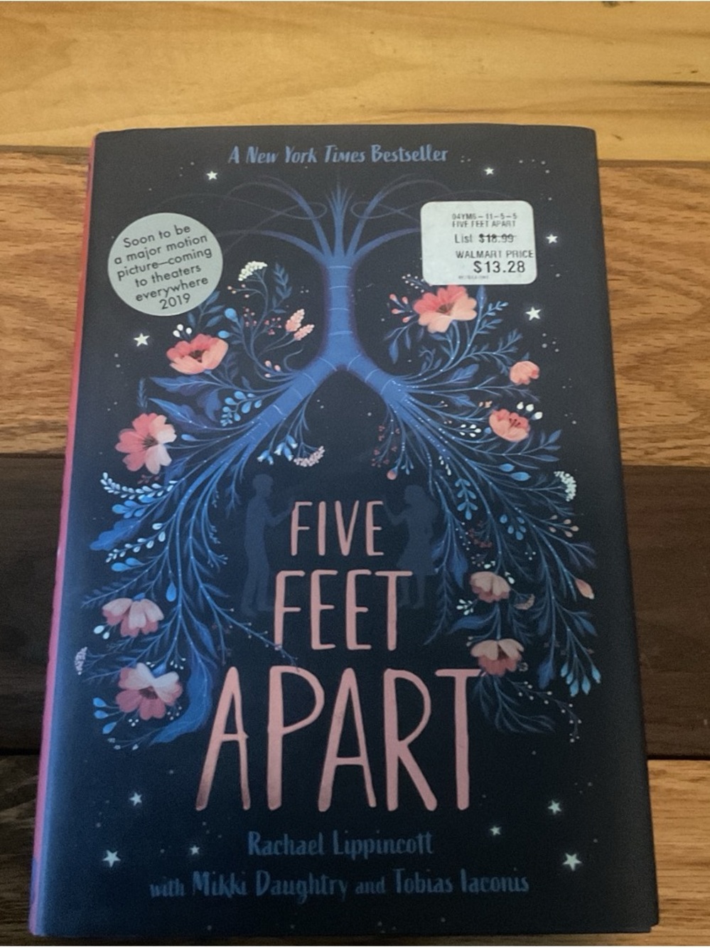 Five Feet Apart by Rachael Lippincott — Navy Cover with Pink Floral Design
